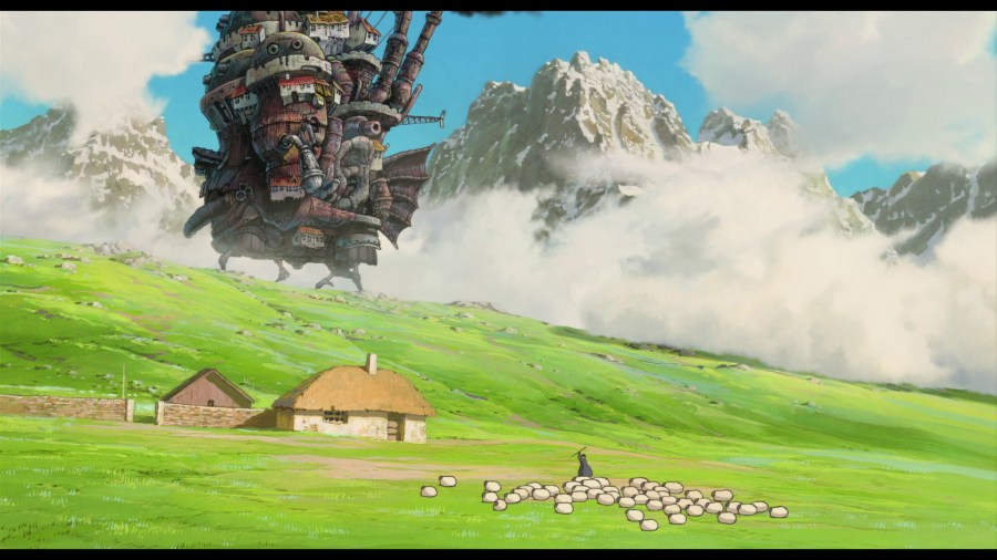 El castillo ambulante subiendo una pradera donde un pastor cuida su rebaño de ovejas